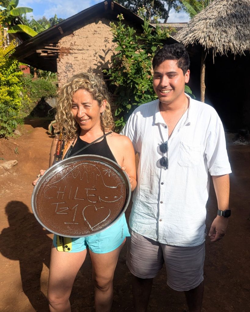 Volunteer enjoying a day trip to Materuni Waterfalls and coffee tour near Mount Kilimanjaro, Tanzania, cultural experience and adventure during a volunteer program in Africa.